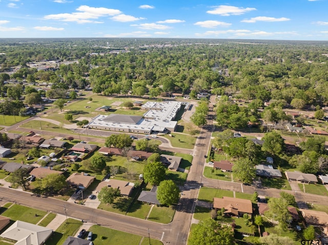 314 Cedar St, Mount Pleasant, TX 75455 - bird's eye view featuring a view of trees and a residential view