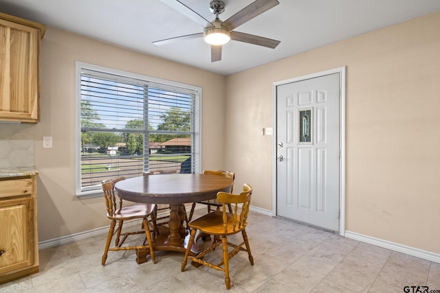 314 Cedar St, Mount Pleasant, TX 75455 - dining space with baseboards and ceiling fan