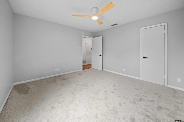 4715 Edinburgh Dr, Tyler, TX 75703 - unfurnished bedroom with carpet, baseboards, and ceiling fan