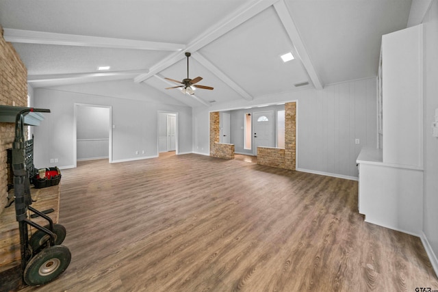 4715 Edinburgh Dr, Tyler, TX 75703 - unfurnished living room with wood finished floors, ceiling fan, a brick fireplace, and baseboards