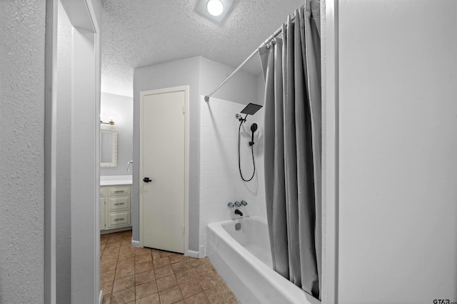 4715 Edinburgh Dr, Tyler, TX 75703 - full bathroom featuring a textured ceiling, shower / bath combo with shower curtain, tile patterned flooring, and vanity