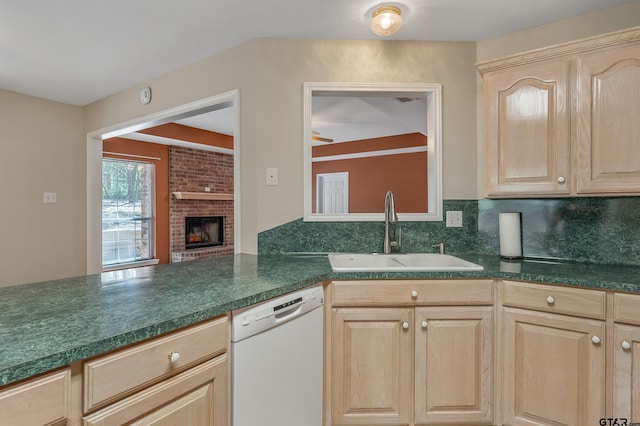 kitchen with dishwasher and light brown cabinets