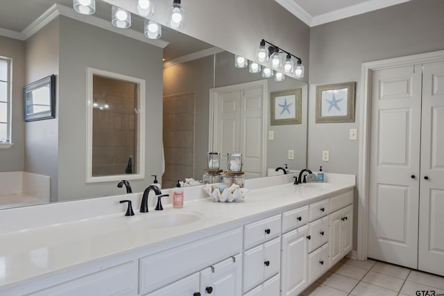 bathroom featuring tile patterned floors, vanity, and crown molding