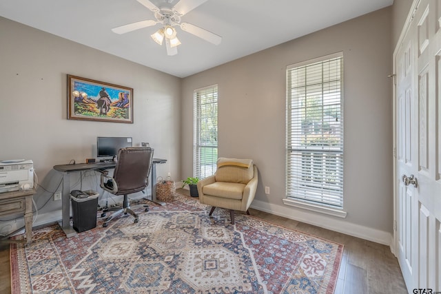 home office featuring ceiling fan and hardwood / wood-style floors