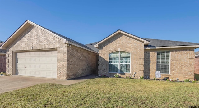 single story home featuring a front yard and a garage