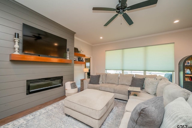 4523 Lone Oak Ln, Longview, TX 75605 - living area with wood finished floors, crown molding, recessed lighting, ceiling fan, and a glass covered fireplace