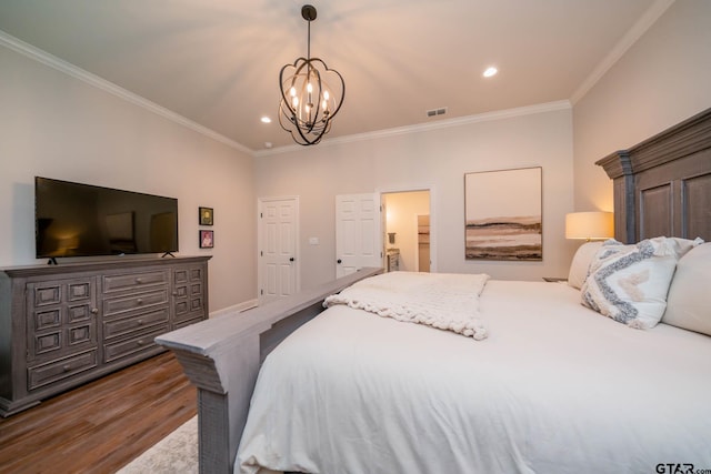 4523 Lone Oak Ln, Longview, TX 75605 - bedroom featuring dark wood-style floors, a chandelier, ornamental molding, and recessed lighting