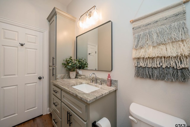 4523 Lone Oak Ln, Longview, TX 75605 - half bathroom with vanity and wood finished floors