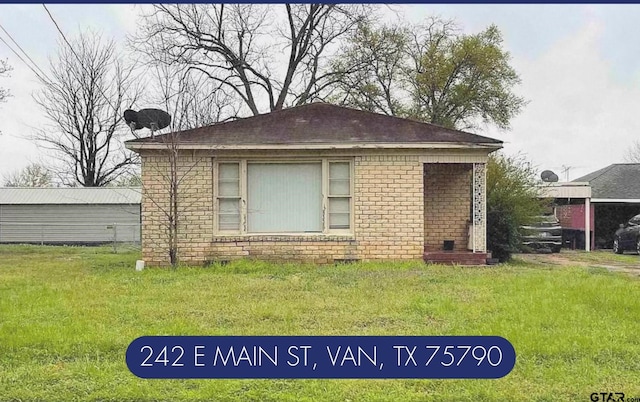 exterior space with a front yard