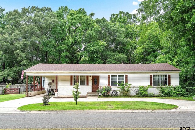 902 S Florey, Mount Pleasant, TX 75455 - view of front of house with a porch and concrete driveway