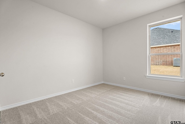 unfurnished room featuring carpet flooring