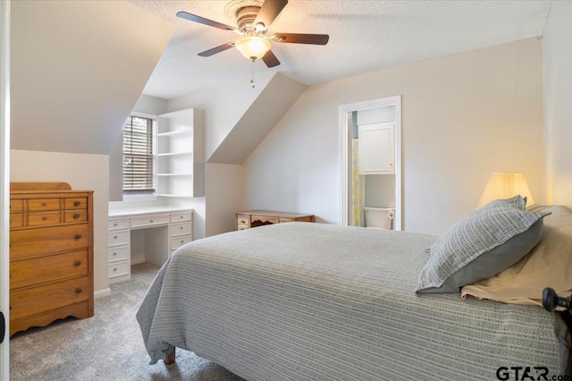 2733 Rockbridge Rd, Tyler, TX 75701 - bedroom featuring light carpet, ceiling fan, a textured ceiling, and lofted ceiling