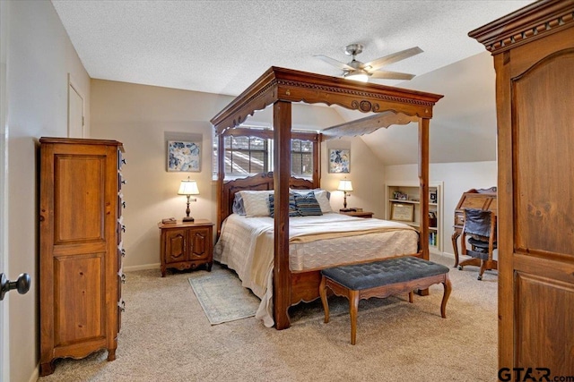 2733 Rockbridge Rd, Tyler, TX 75701 - bedroom featuring light carpet, vaulted ceiling, a textured ceiling, and a ceiling fan