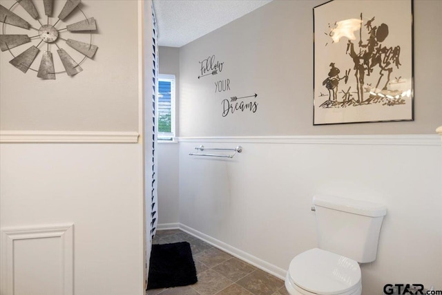 2733 Rockbridge Rd, Tyler, TX 75701 - bathroom featuring toilet and baseboards