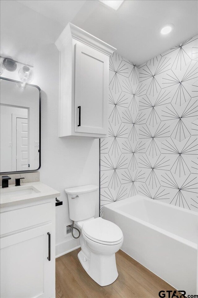 2099 Jackie Ave, Tyler, TX 75703 - full bath with vanity and wood finished floors