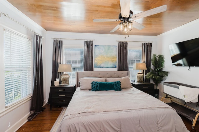 bedroom with wooden ceiling, baseboards, dark wood-style flooring, and ornamental molding