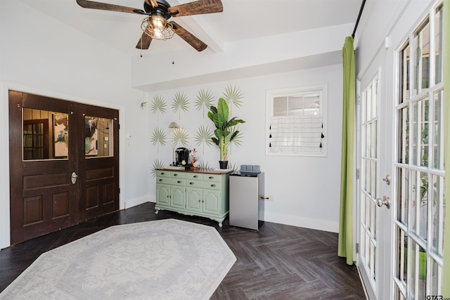 bedroom with a ceiling fan, french doors, and baseboards