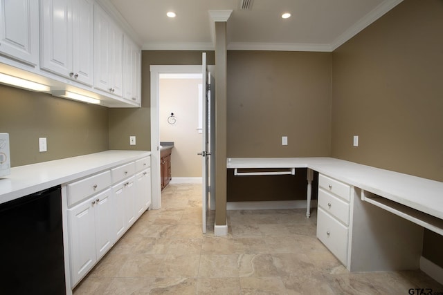 18722 Ridgeline Rd, Tyler, TX 75703 - kitchen with crown molding, refrigerator, white cabinets, light countertops, and baseboards