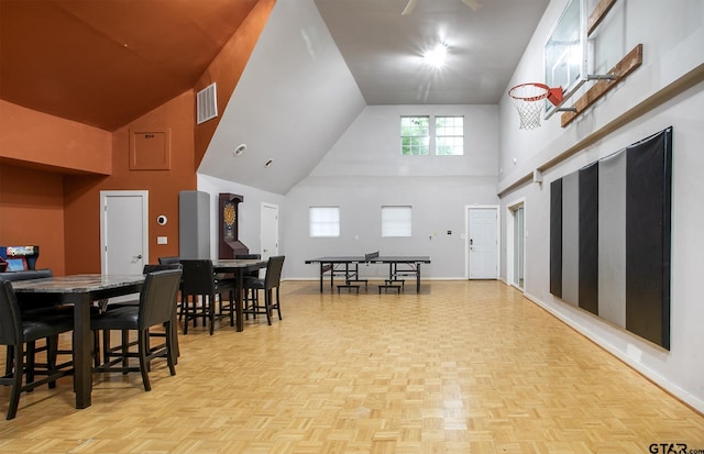 18722 Ridgeline Rd, Tyler, TX 75703 - dining space with high vaulted ceiling, baseboards, and healthy amount of natural light