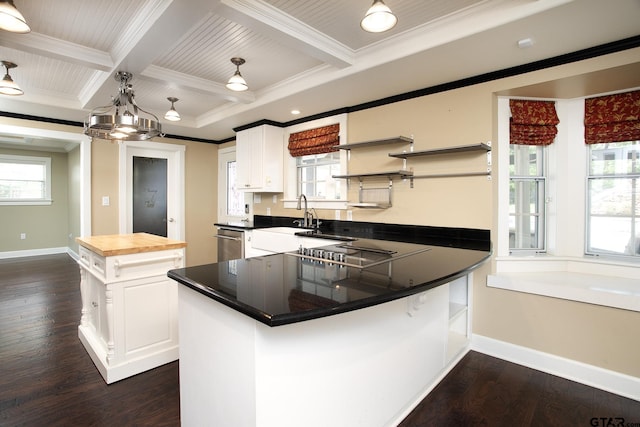 18722 Ridgeline Rd, Tyler, TX 75703 - kitchen with open shelves, dishwasher, beamed ceiling, black electric stovetop, and white cabinetry