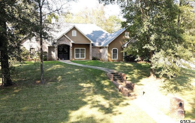 view of front of home with a front lawn