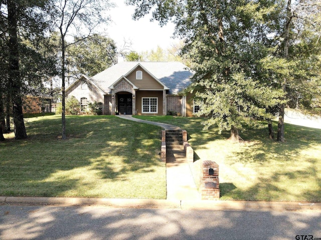 view of front of house with a front lawn