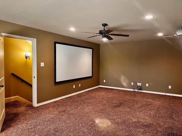 cinema room featuring ceiling fan