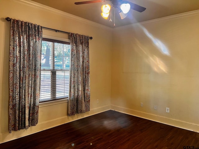 spare room with ornamental molding, hardwood / wood-style flooring, and a healthy amount of sunlight