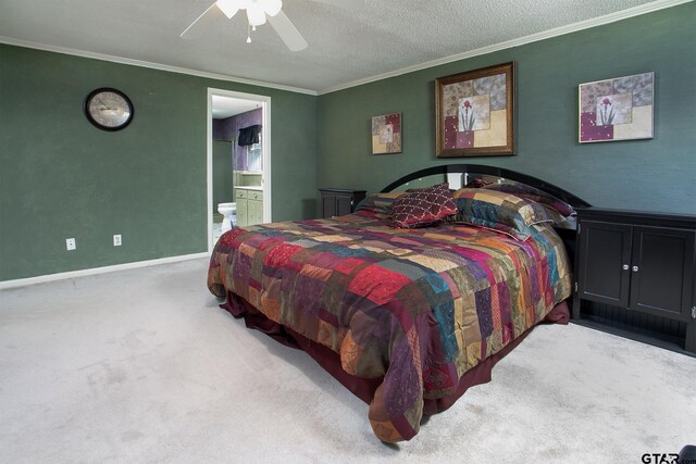 10187 Crestview Dr, Tyler, TX 75707 - carpeted bedroom featuring crown molding, ceiling fan, ensuite bath, and a textured ceiling