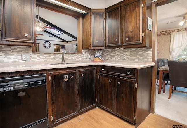 10187 Crestview Dr, Tyler, TX 75707 - kitchen with dishwasher, ceiling fan, light countertops, dark brown cabinets, and backsplash