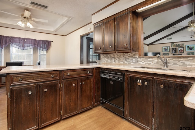 10187 Crestview Dr, Tyler, TX 75707 - kitchen with black dishwasher, a ceiling fan, light wood finished floors, light countertops, and ornamental molding