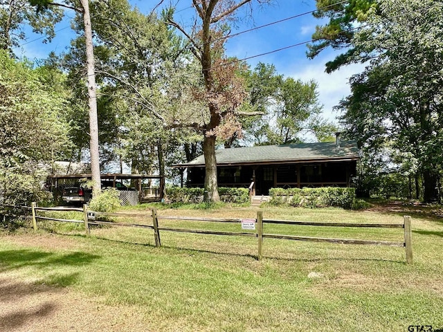 view of yard featuring a carport