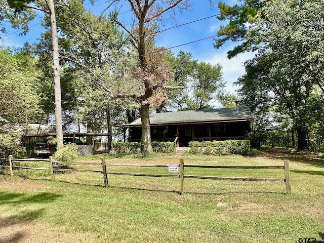 view of yard featuring a carport