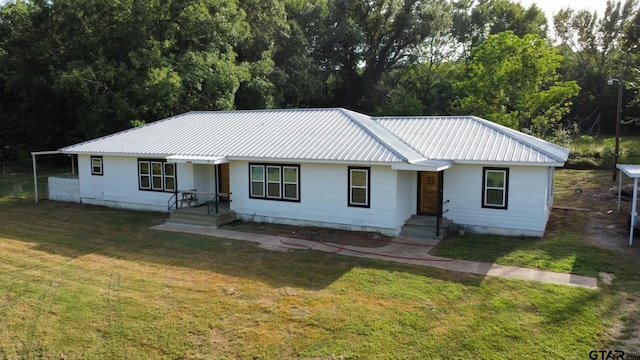 ranch-style house with a front yard