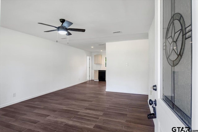 interior space with ceiling fan, dark wood-style flooring, visible vents, and recessed lighting