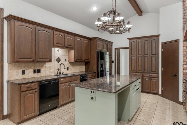 4601 Dickens, Athens, TX 75751 - kitchen with dishwasher, a sink, stainless steel refrigerator with ice dispenser, light tile patterned floors, and a center island