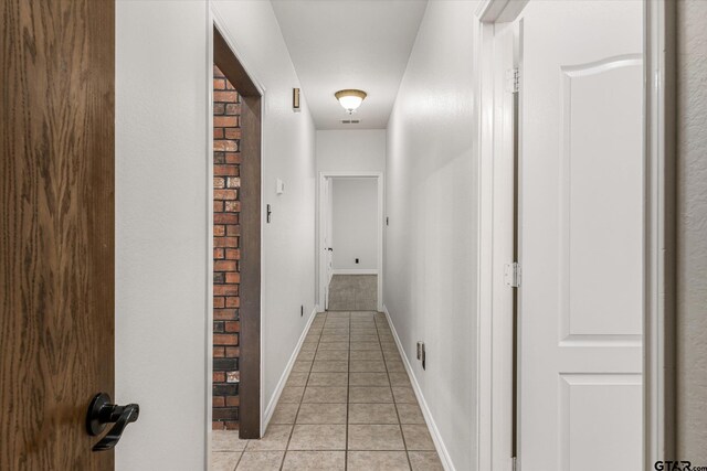 4601 Dickens, Athens, TX 75751 - corridor with light tile patterned floors and baseboards
