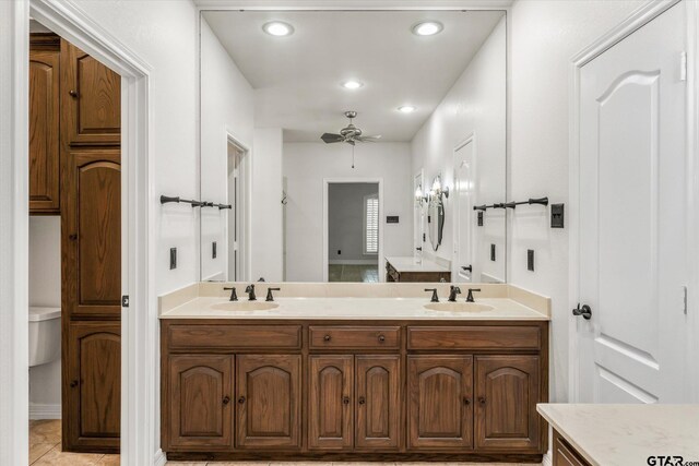 4601 Dickens, Athens, TX 75751 - bathroom with double vanity, ceiling fan, recessed lighting, and tile patterned flooring