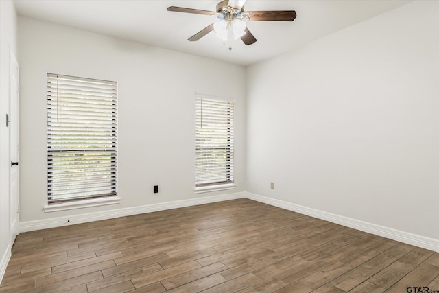 4601 Dickens, Athens, TX 75751 - unfurnished room with wood finished floors, a ceiling fan, and baseboards