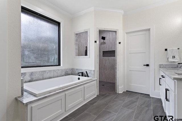 bathroom with tile patterned flooring, vanity, ornamental molding, and shower with separate bathtub