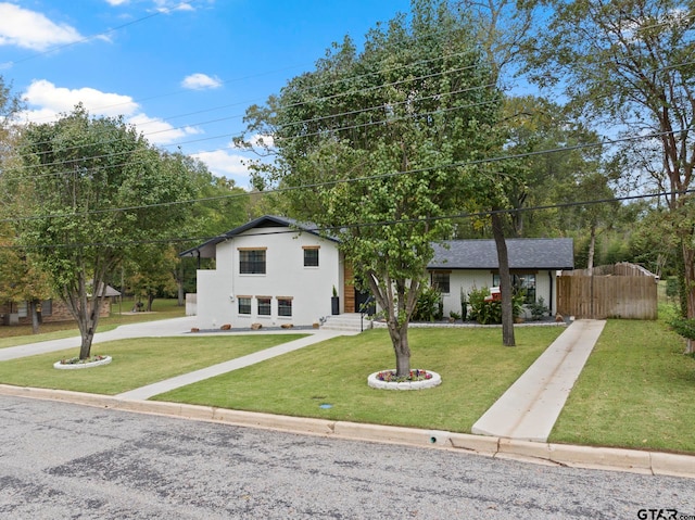 view of front of property with a front lawn