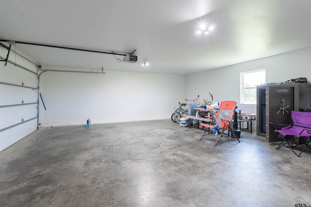 garage featuring a garage door opener