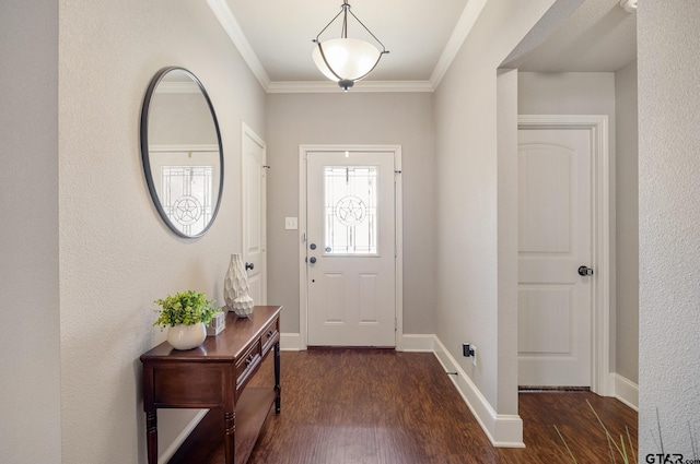 entryway with baseboards, wood finished floors, and ornamental molding