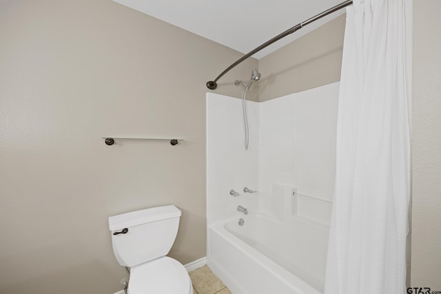 bathroom with tile patterned flooring, toilet, and shower / tub combo with curtain