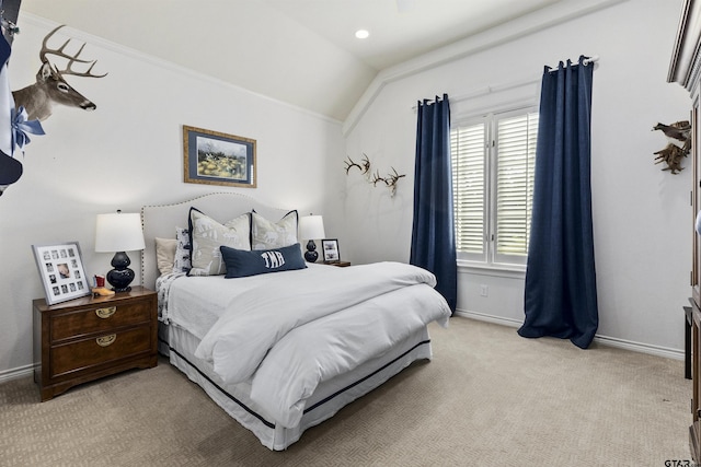 bedroom featuring light colored carpet and lofted ceiling