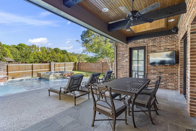 view of patio featuring a pool with hot tub, pool water feature, and ceiling fan