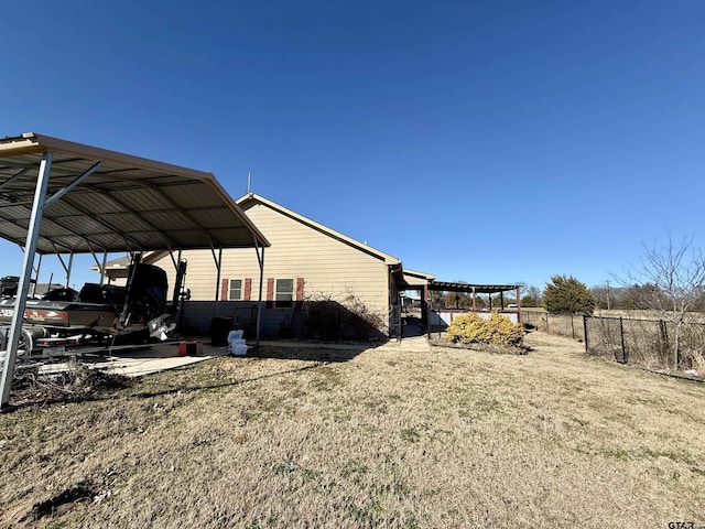 view of yard featuring a carport