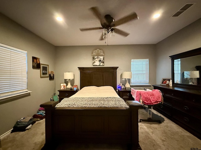 carpeted bedroom featuring ceiling fan