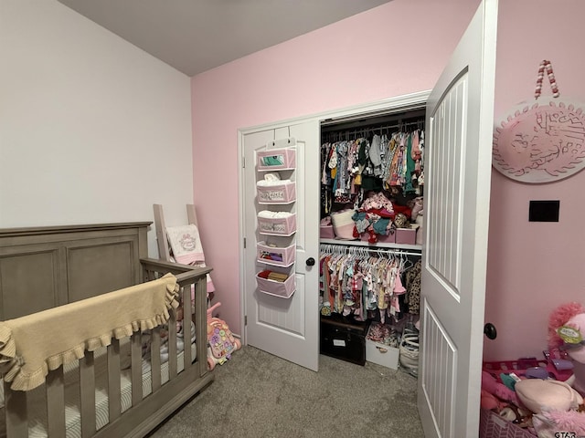 carpeted bedroom with a closet