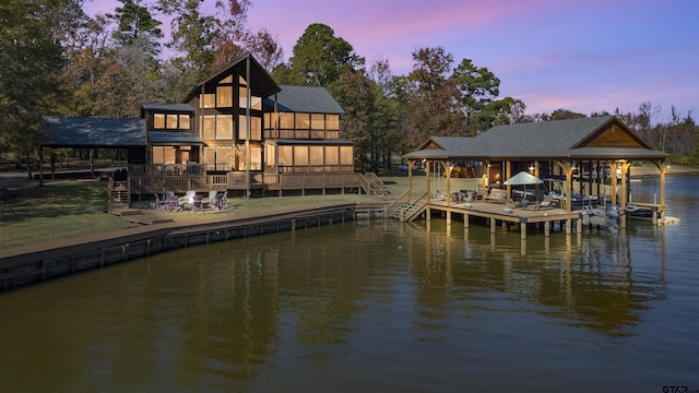 dock area with a water view